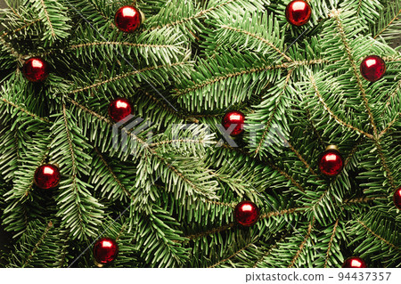 Creative Christmas holidays background with fir twigs Creative Christmas holidays background with fir twigs 94437357