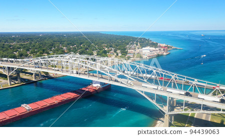 Aerial of the Blue Water Bridge and Lake Freighter in Sarnia, Canada Aerial of the Blue Water Bridge and Lake Freighter in Sarnia, Canada 94439063