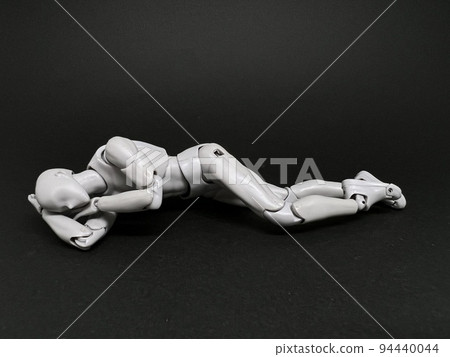 Drawing doll lying down in Nirvana pose 94440044