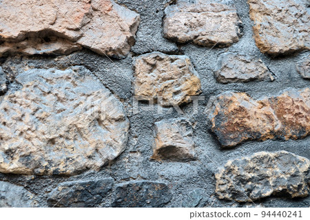 Stone concrete fence wall, stone background, texture. Stone concrete fence wall, stone background, texture. 94440241