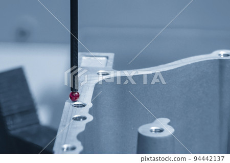 The CMM machine measuring the aluminum automotive parts. The CMM machine measuring the aluminum automotive parts. 94442137