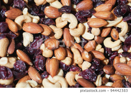 close up of many mixed nuts  94442383