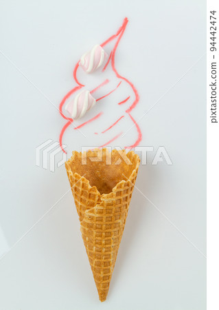Real waffle cone with marshmallows and hand drawn cream. Real waffle cone with marshmallows and hand drawn cream. 94442474