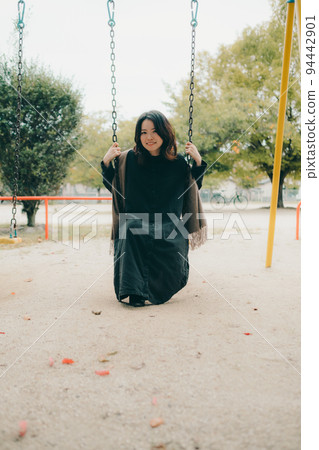 A woman in a park 94442901