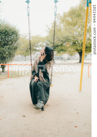 A woman in a park 94443385