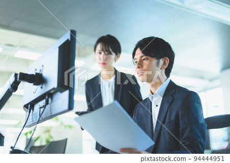 Boss man checking documents in the office 94444951