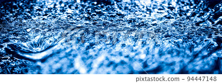 Blue water background. Texture of water. Splash. Banner size Blue water background. Texture of water. Splash. Banner size 94447148