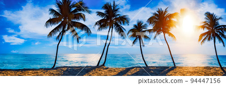 Fantasy Island. Palm trees, Sunset sea landscape. Colorful ocean beach sunrise 94447156