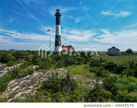 Fire Island Lighthouse from the bay side with the museum Fire Island Lighthouse from the bay side with the museum 94448574