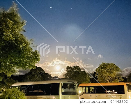 dazzling moon floating in the night sky dazzling moon floating in the night sky 94448802