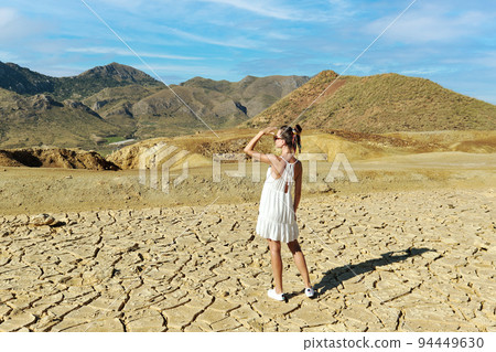 Rear view female tourist visit mines of Mazarron in Murcia 94449630