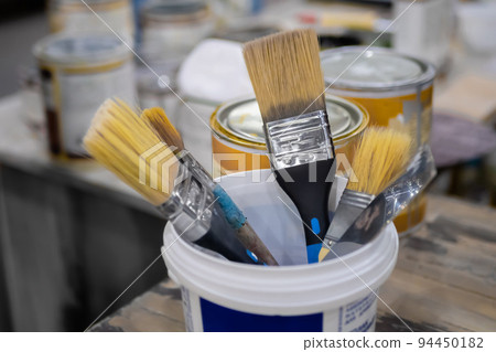 Set of paint brush for woodworking in bucket at workshop Set of paint brush for woodworking in bucket at workshop 94450182