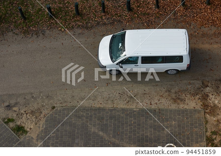 White van on a small road 94451859