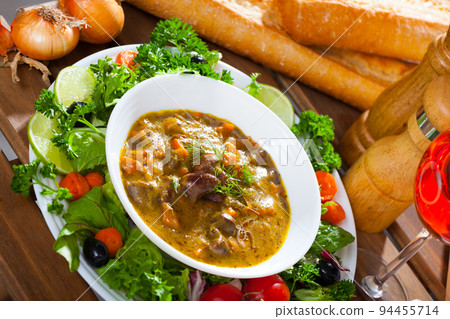 Goulash of chicken hearts with vegetables Goulash of chicken hearts with vegetables 94455714