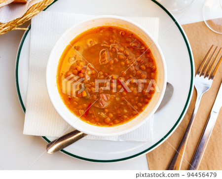 Stew of lentils with meat, horizo sausage and vegetables 94456479