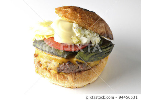 Avocado cheeseburger shot against a white background Avocado cheeseburger shot against a white background 94456531