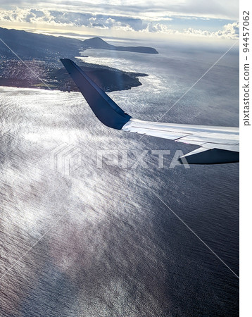 Jet Airplane Flying Over Oahu Island Hawaii Pacific Ocean Jet Airplane Flying Over Oahu Island Hawaii Pacific Ocean 94457062