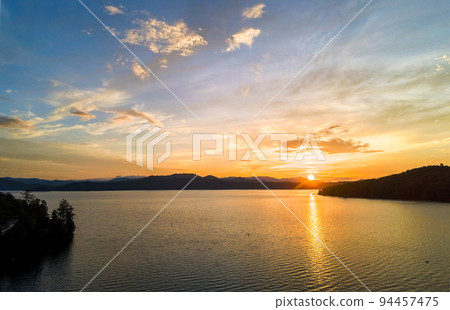 beautiful early morning sunrise on lake jocassee south carolina 94457475