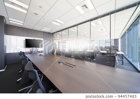 Meeting room with a large monitor Office interior view Interior business image Meeting room with a large monitor Office interior view Interior business image 94457483