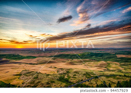 Sun setting below the horizon in a loose region of eastern Washington 94457929