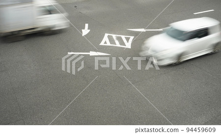 Instructions on how to turn right written inside the intersection Instructions on how to turn right written inside the intersection 94459609