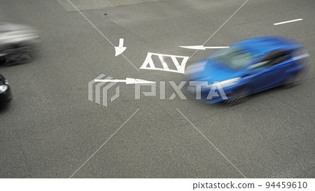 Instructions on how to turn right written inside the intersection Instructions on how to turn right written inside the intersection 94459610
