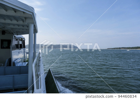 Shikanoshima seen from a ferry navigating Hakata Bay Shikanoshima seen from a ferry navigating Hakata Bay 94460834