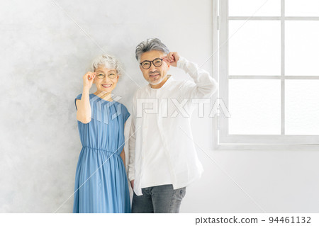 senior couple wearing glasses senior couple wearing glasses 94461132