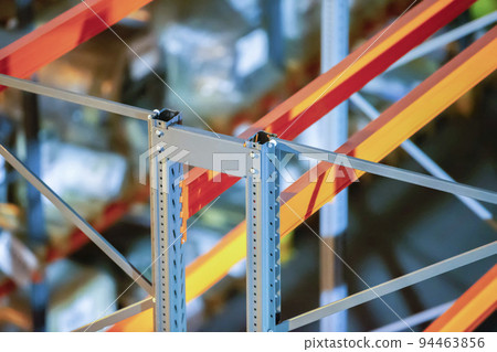 Metal joints of warehouse shelves. Metal joints of warehouse shelves. 94463856