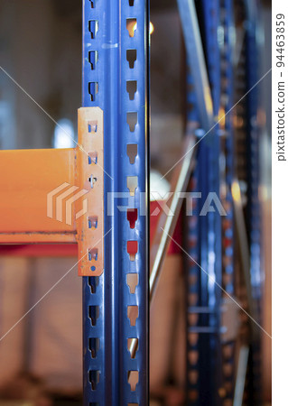 Metal joints of warehouse shelves. Metal joints of warehouse shelves. 94463859