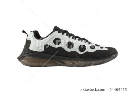 Black sneakers with white inserts isolated on white background. Black sneakers with white inserts isolated on white background. 94464455