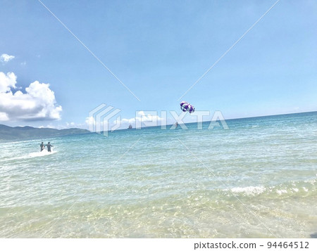 Sea and motor paraglider (My Khe Beach, Vietnam) Sea and motor paraglider (My Khe Beach, Vietnam) 94464512