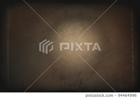 Vintage brown background with cracks and scratches with a light spot. Grunge retro background. Vintage brown background with cracks and scratches with a light spot. Grunge retro background. 94464996