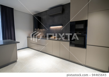 Contemporary kitchen with the high-tech cooking equipment Contemporary kitchen with the high-tech cooking equipment 94465643
