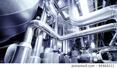 Equipment, cables and piping as found inside of a modern industrial power plant Equipment, cables and piping as found inside of a modern industrial power plant 94468211