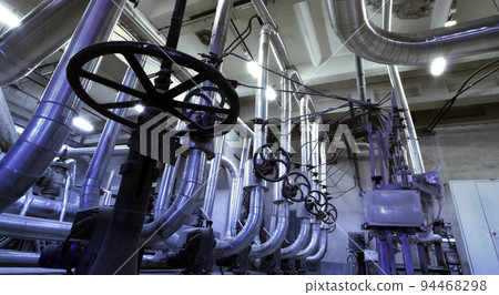 Equipment, cables and piping as found inside of industrial power plant Equipment, cables and piping as found inside of industrial power plant 94468298