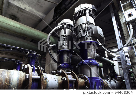Equipment, cables and piping as found inside of industrial power plant Equipment, cables and piping as found inside of industrial power plant 94468304