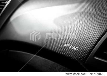 The inscription airbag in the cabin on the front panel of the car above the glove compartment 94469879