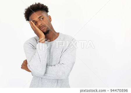 Portrait of bored African American man looking away Portrait of bored African American man looking away 94470896
