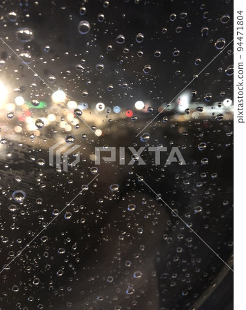 raindrops and night view raindrops and night view 94471804