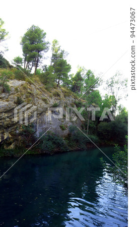 Beautiful unique landscape, mountain river, bay waterfall among the rocks, natural pools, SPA, Ontinyent, Spain Beautiful unique landscape, mountain river, bay waterfall among the rocks, natural pools, SPA, Ontinyent, Spain 94473067