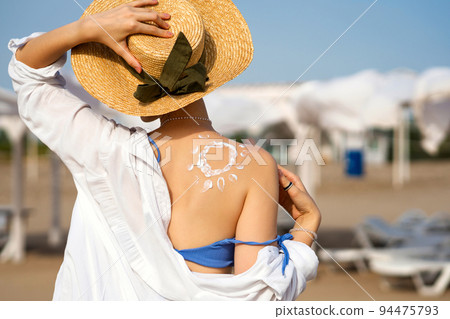 Girl with Sunscreen in form Sun Girl with Sunscreen in form Sun 94475793