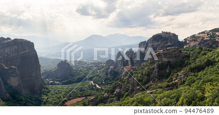 Thessaly plain landscape and byzantine monasteries of Meteora perched on sheer rocks 94476489