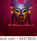 Peruvian Mayan Mask on stand in studio. Multi color. Ancient art. Studio Backdrop. Filmic lighting. Front light. Top light. Directional lighting. 94478626