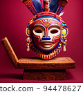 Peruvian Mayan Mask on stand in studio. Multi color. Ancient art. Studio Backdrop. Filmic lighting. Front light. Top light. Directional lighting. 94478627