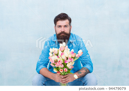 celebrates holiday on March 8. happy fathers day concept. Womens day present. Fresh colorful tulips. gift with love. Easter and surprise concept. International Womans Day. Happy Birthday greeting 94479079