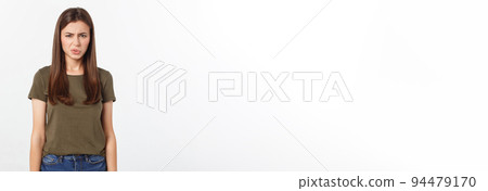 Close-up portrait of a young attractive woman who covers her nose, something stinks, isolated on white background Close-up portrait of a young attractive woman who covers her nose, something stinks, isolated on white background 94479170