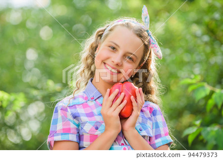Harvest season. Girl adorable child farming. Buy organic food. Kid work at farm. Child carry harvest. Sunny day at farm. Vegetables in basket. Little helper concept. Ripe veggies. Family farm Harvest season. Girl adorable child farming. Buy organic food. Kid work at farm. Child carry harvest. Sunny day at farm. Vegetables in basket. Little helper concept. Ripe veggies. Family farm 94479373