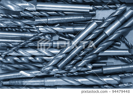 Close-up scene the group of used hole tools for CNC milling machine. Close-up scene the group of used hole tools for CNC milling machine. 94479448