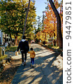 Parent-child walk in autumn 94479851
